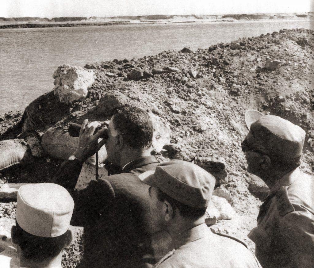 President Gamal Abdel Nasser of Egypt surveys positions at the Suez Canal in 1968 during the War or Attrition. The Soviet Union provided support to Egyptian forces during this war. Wikimedia Commons